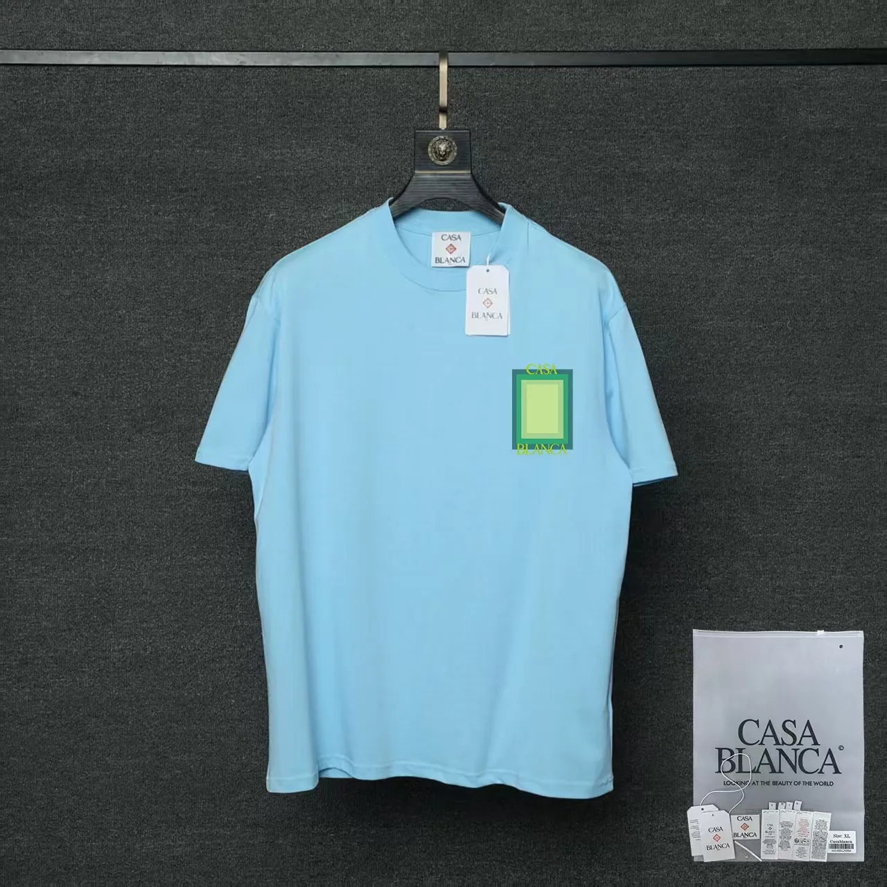 26ss CASABLANCA original printing process short-sleeved T-shirt original development using high-density double yarn pure cotton fabric upper body soft and comfortable color Black White Dark Green color Orange Pink Blue Royal Blue color cigarette powder 8 colors Sizes S M L XL